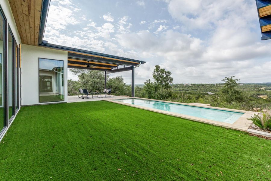 A private swimming pool and patio provide a serene oasis with breathtaking views.
