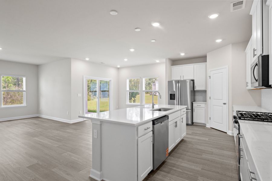 Furnished interior view inside a new home in Cypress Ridge - The Coastline Series, Longs (Image 9).