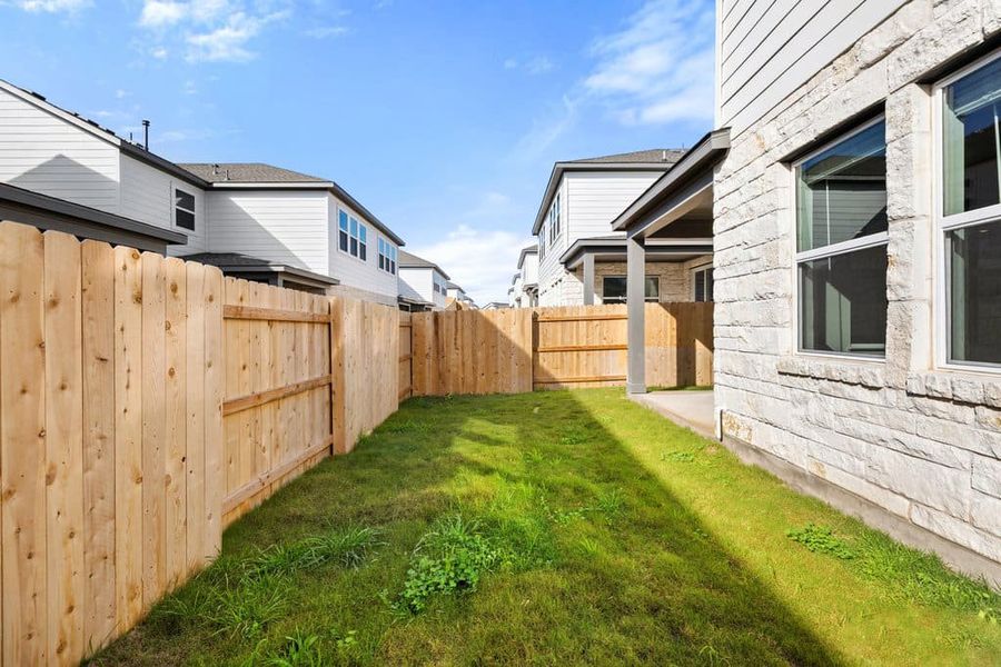 Exterior details and patio area of a home in Park Central, Georgetown (Image 25).