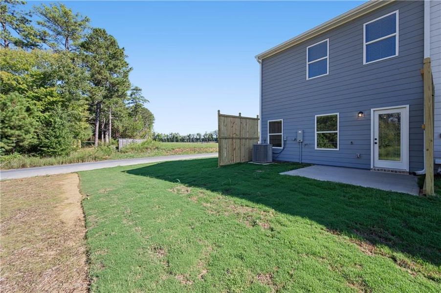Exterior details and patio area of a home in Village Green, Adairsville (Image 3).