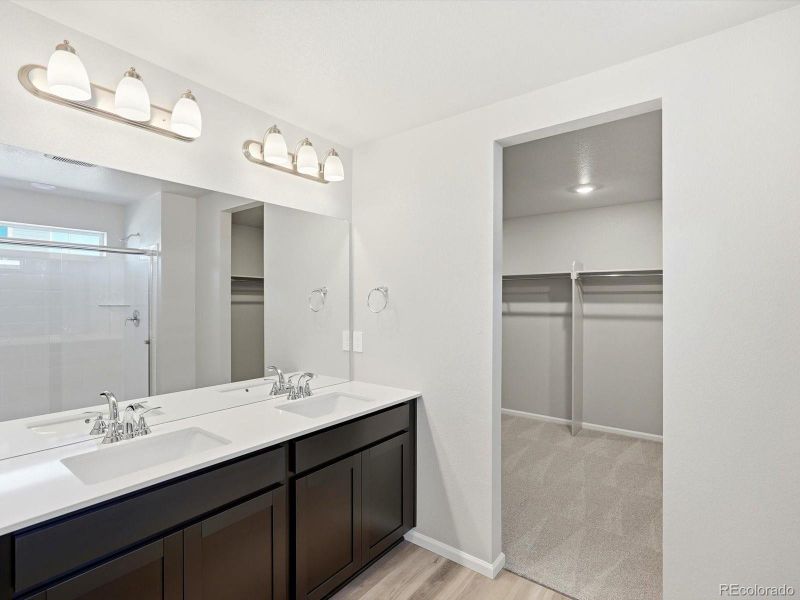 Furnished interior view inside a new home in Buffalo Highlands: The Flora Collection, Commerce City (Image 9).