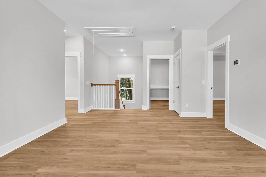 Spacious, unfurnished interior of a new home in Hidden Ponds Reserve, Awendaw (Image 31).