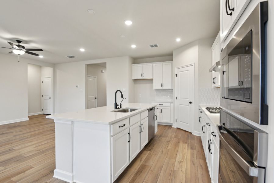 Representative furnished interior of a home built from the Makenzie by Ashton Woods in Hennersby Hollow, San Antonio (Image 3).