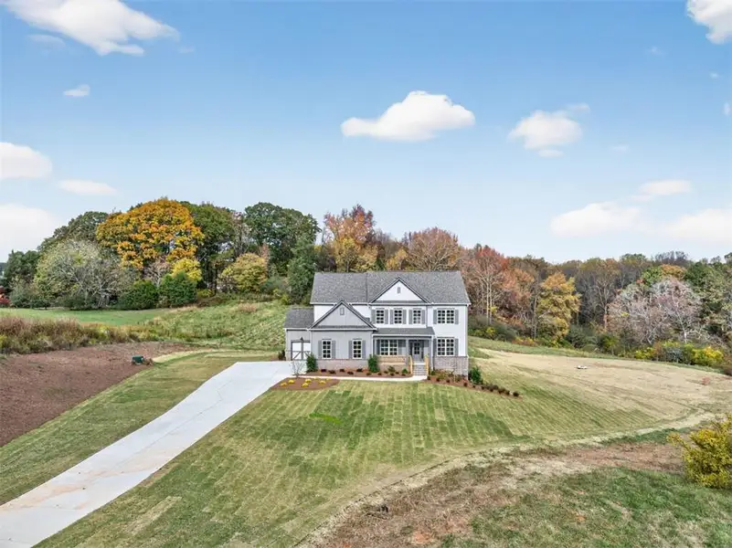 Front exterior of a new home in , Gainesville, GA, highlighting curb appeal (Image 28).