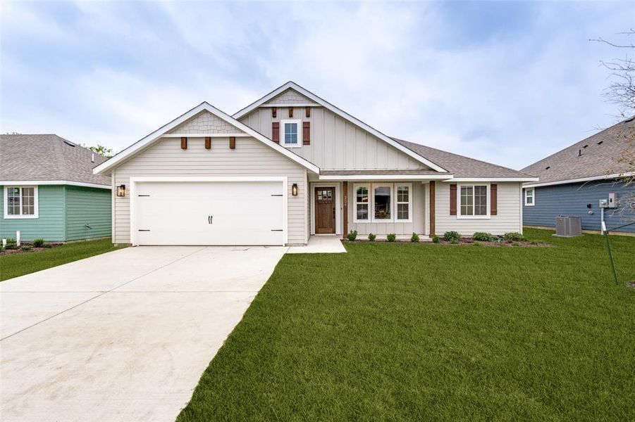 Front exterior of a new home in , Whitesboro, TX, highlighting curb appeal (Image 1). Front exterior of a new home in , Whitesboro, TX, highlighting curb appeal (Image 1).