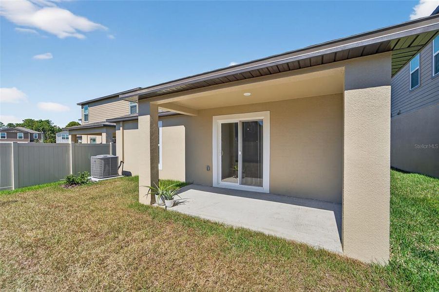 Exterior details and patio area of a home in Angeline: The Manors, Land O' Lakes (Image 3). Exterior details and patio area of a home in Angeline: The Manors, Land O' Lakes (Image 3).
