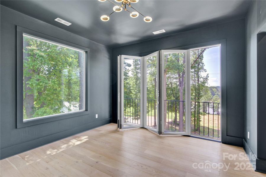 Upper level game room with pocket doors Upper level game room with pocket doors