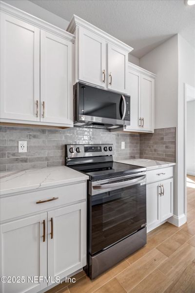 Furnished interior view inside a new home in , Palm Coast (Image 5). Furnished interior view inside a new home in , Palm Coast (Image 5).