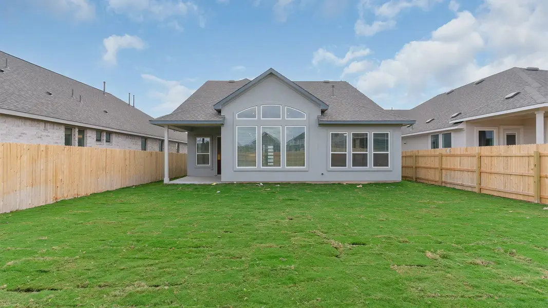 Exterior details and patio area of a home in Lariat, Liberty Hill (Image 4).