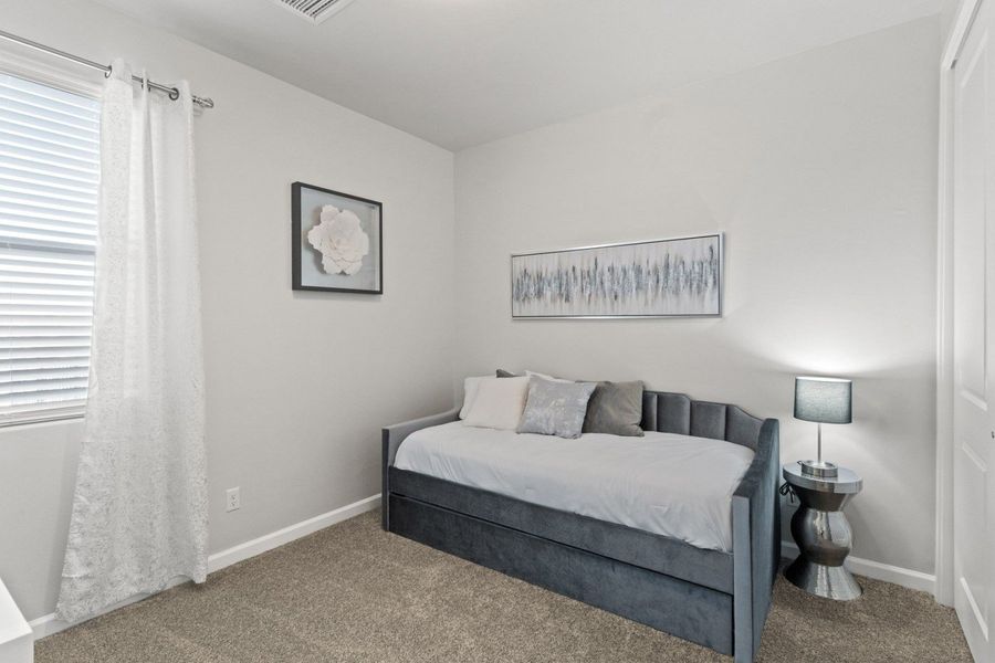 Representative furnished interior of a home built from the Valencia by Hakes Brothers in Hillside Park, El Paso (Image 31).