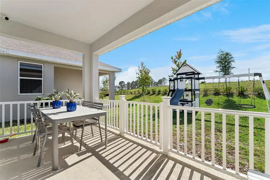 Exterior details and patio area of a home in , Minneola (Image 3).