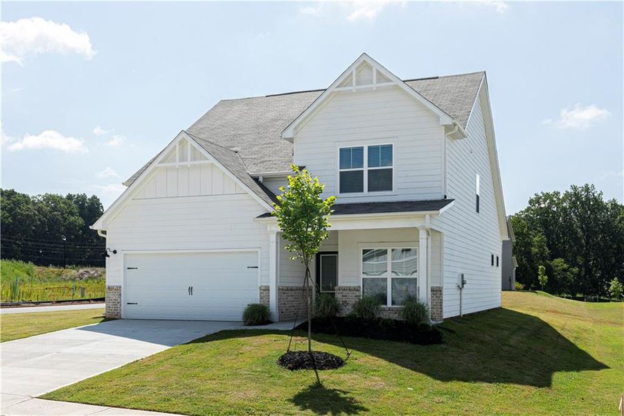 Front exterior of a new home in Lake Preserve at Jackson Trail, Jefferson, GA, highlighting curb appeal (Image 1). Front exterior of a new home in Lake Preserve at Jackson Trail, Jefferson, GA, highlighting curb appeal (Image 1).