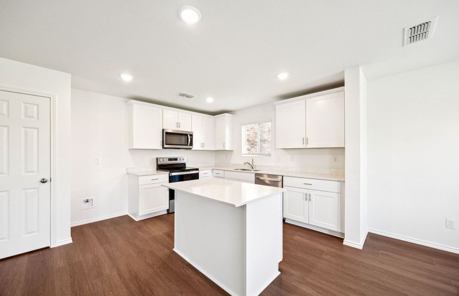 Representative furnished interior of a home built from the Monroe by Centex in Ashford Crossing, Princeton (Image 4).