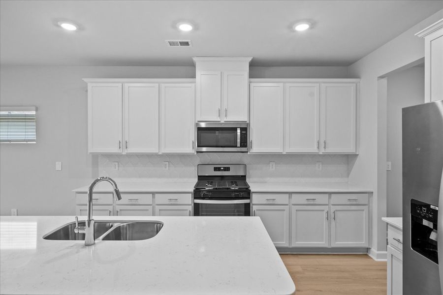 Furnished interior view inside a new home in The Farm at Wells Creek - Signature Collection, Gray Court (Image 3).