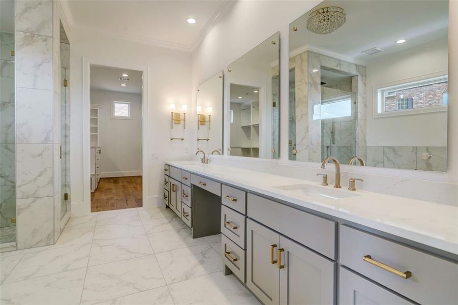 Luxurious primary bath w/ dual vanities