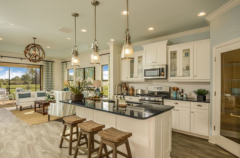 Representative furnished interior of a home built from the Tidewinds by Neal Communities in Boca Royale Golf and Country Club at Wellen Park, Englewood (Image 6).