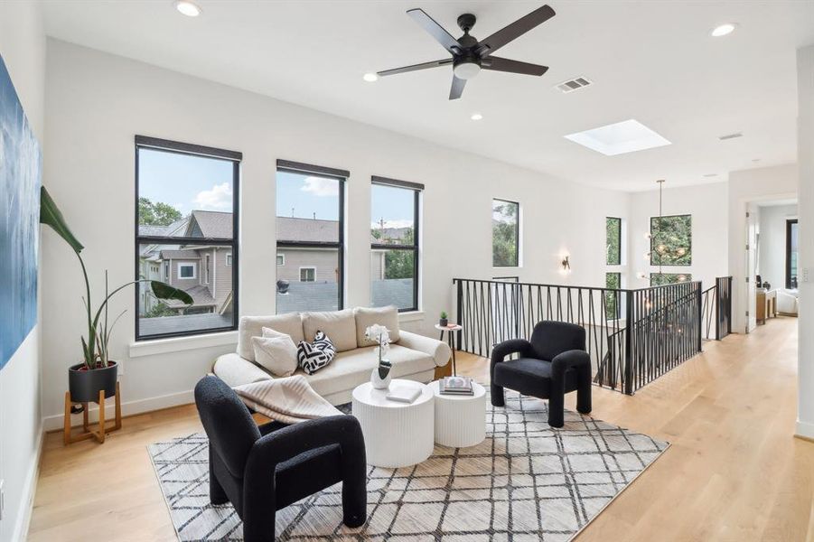 Another view of the second floor flex space. The sources of light in this home do not dissappoint.