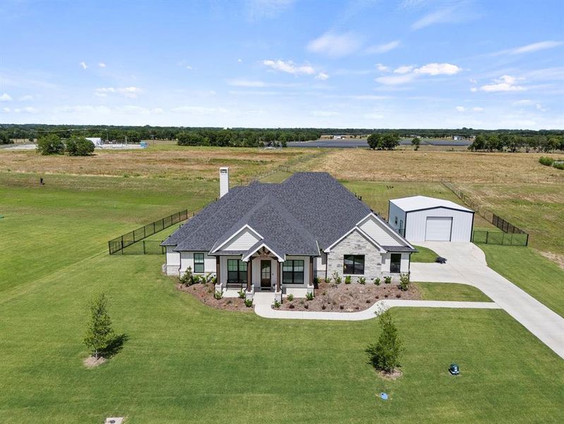 Front exterior of a new home in , Caddo Mills, TX, highlighting curb appeal (Image 1). Front exterior of a new home in , Caddo Mills, TX, highlighting curb appeal (Image 1).