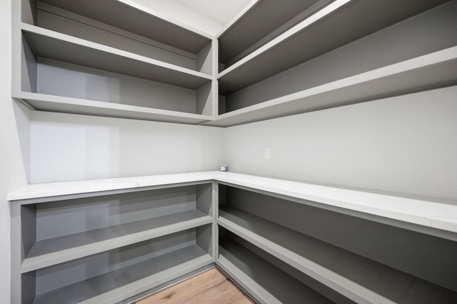 Ample built-in shelving provides generous storage space for all your pantry needs. Ample built-in shelving provides generous storage space for all your pantry needs.