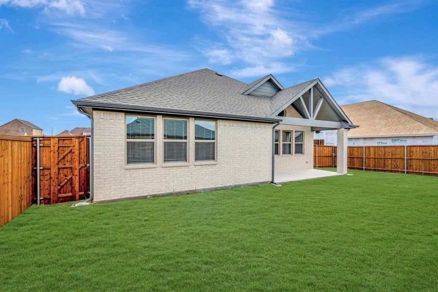 Exterior details and patio area of a home in Gateway Parks, Forney (Image 22). Exterior details and patio area of a home in Gateway Parks, Forney (Image 22).