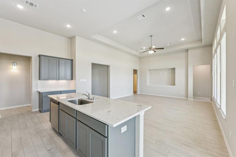 The open-concept layout seamlessly connects the kitchen to the spacious living area.