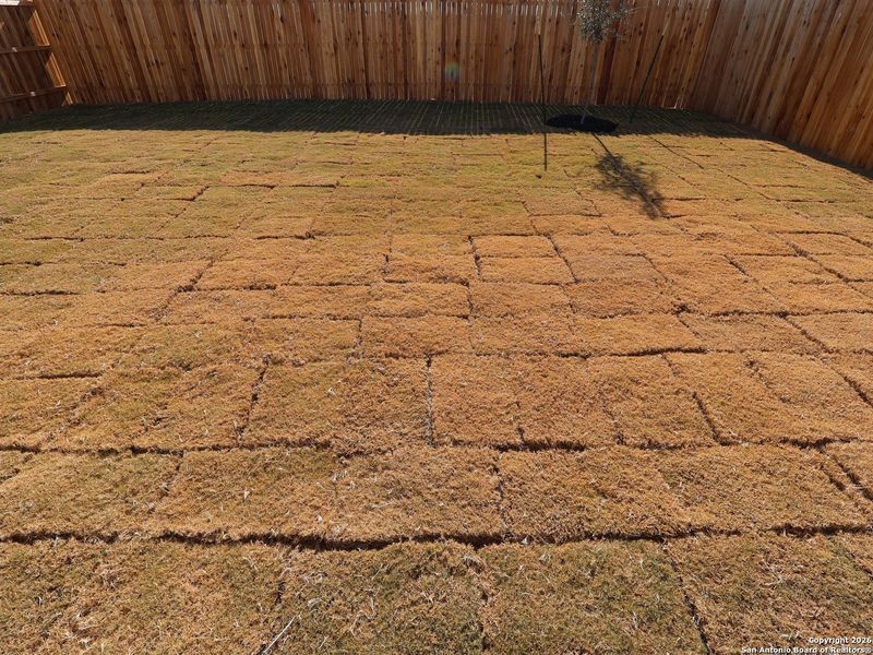 Exterior details and patio area of a home in Winding Brook, San Antonio (Image 4).