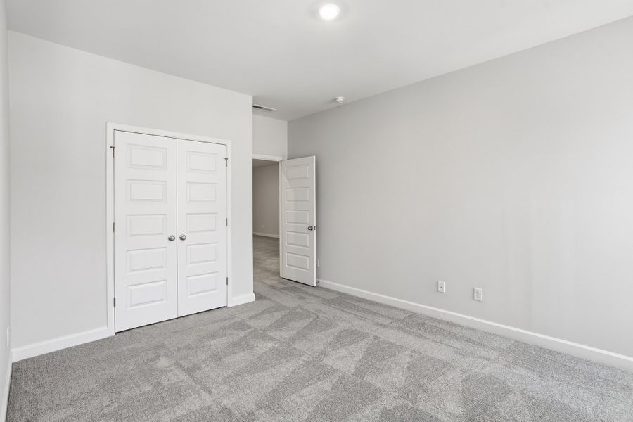 Spacious, unfurnished interior of a new home in Ovation at Sweetbrier, Durham (Image 28).