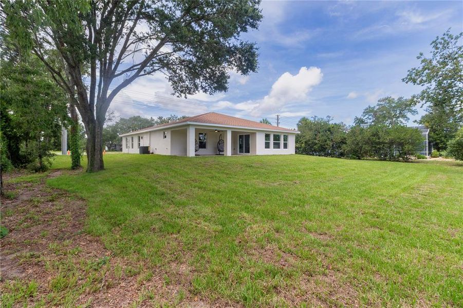 Front exterior of a new home in , Spring Hill, FL, highlighting curb appeal (Image 1).