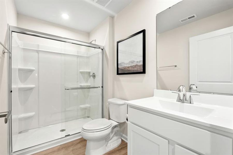 Representative furnished interior of a home built from the Woodford by Ryan Homes in Oakwood Trace, Fairburn (Image 35).