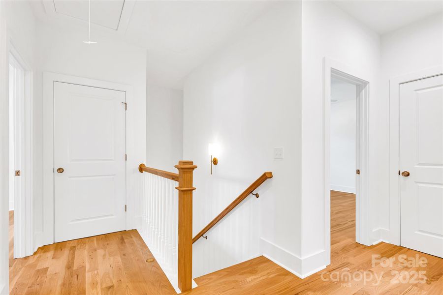 Upstairs with white oak hard wood flooring