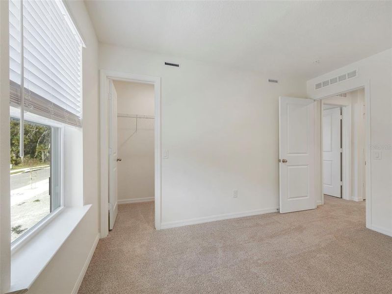 Spacious, unfurnished interior of a new home in Towns at Riverwalk, Sanford (Image 19).