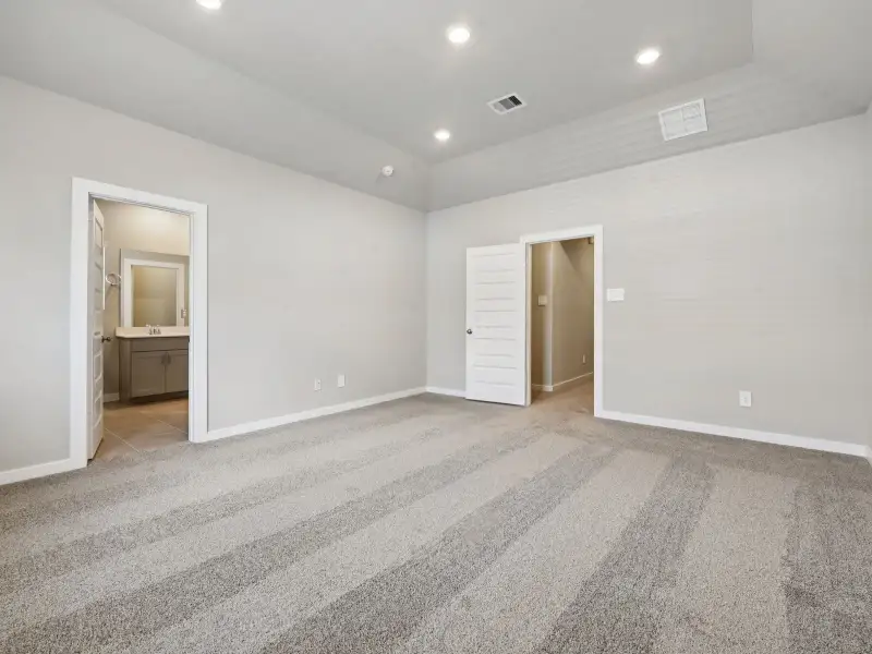 Spacious, unfurnished interior of a new home in Bridge Creek Village - City Series, Cypress (Image 22). Spacious, unfurnished interior of a new home in Bridge Creek Village - City Series, Cypress (Image 22).