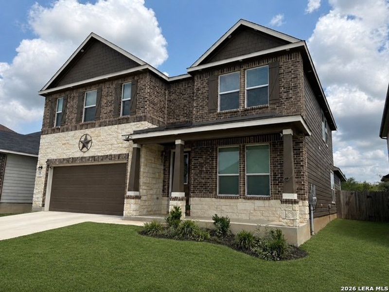 Front exterior of a new home in Canyon Crest, San Antonio, TX, highlighting curb appeal (Image 2). Front exterior of a new home in Canyon Crest, San Antonio, TX, highlighting curb appeal (Image 2).