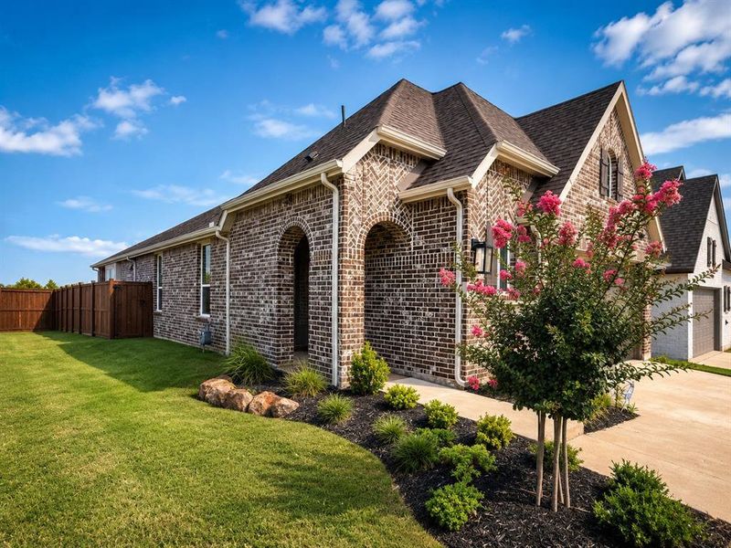 Front exterior of a new home in Bel Air Village, Sherman, TX, highlighting curb appeal (Image 18). Front exterior of a new home in Bel Air Village, Sherman, TX, highlighting curb appeal (Image 18).