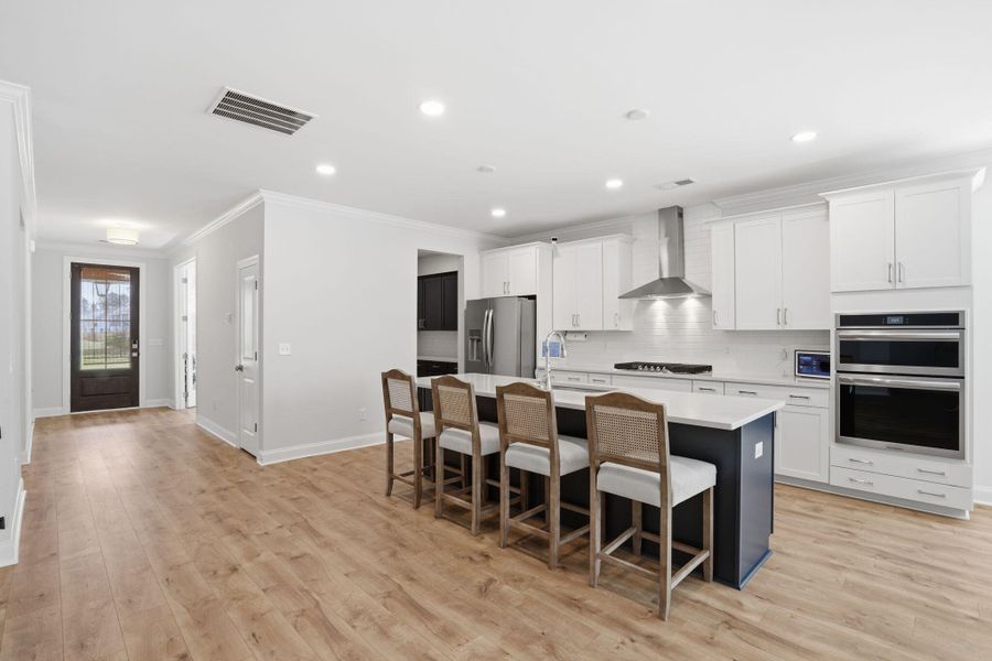 Furnished interior view inside a new home in Tidewater at Lakes of Cane Bay, Summerville (Image 8).