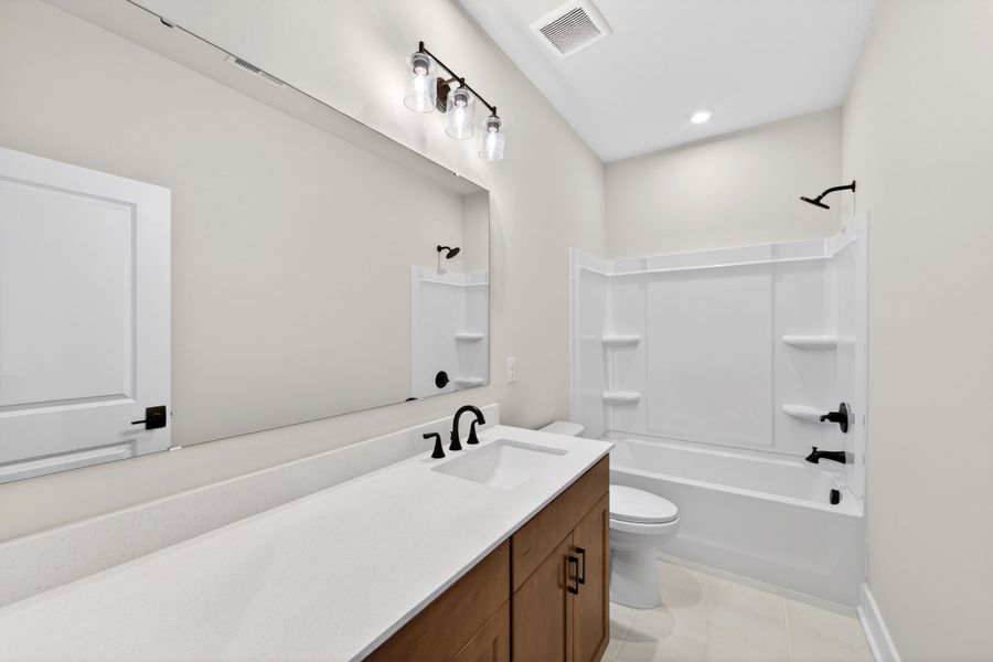 Furnished interior view inside a new home in Seven Oaks, Belmont (Image 16).