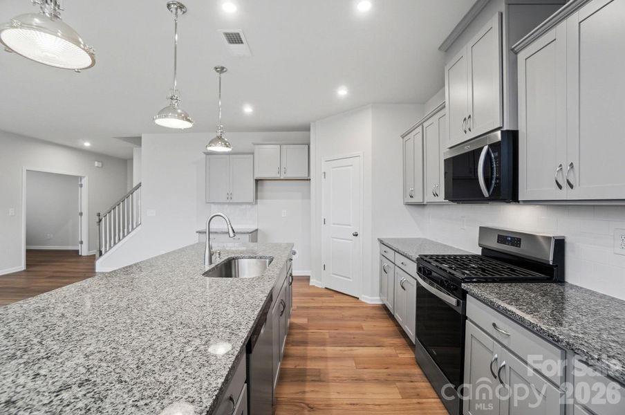 Furnished interior view inside a new home in Waxhaw Landing, Monroe (Image 7).