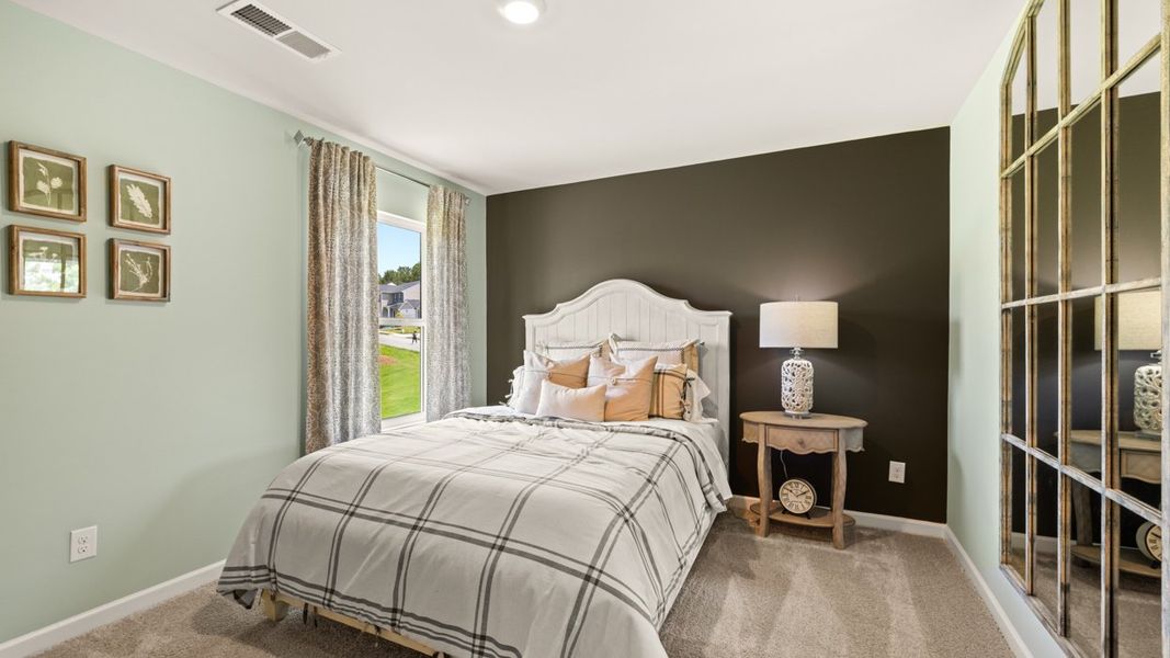 Representative furnished interior of a home built from the Elle by D.R. Horton in The Preserve at Agricultural Village, Perry (Image 34).
