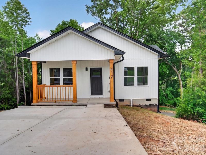Front exterior of a new home in , Hickory, NC, highlighting curb appeal (Image 24).