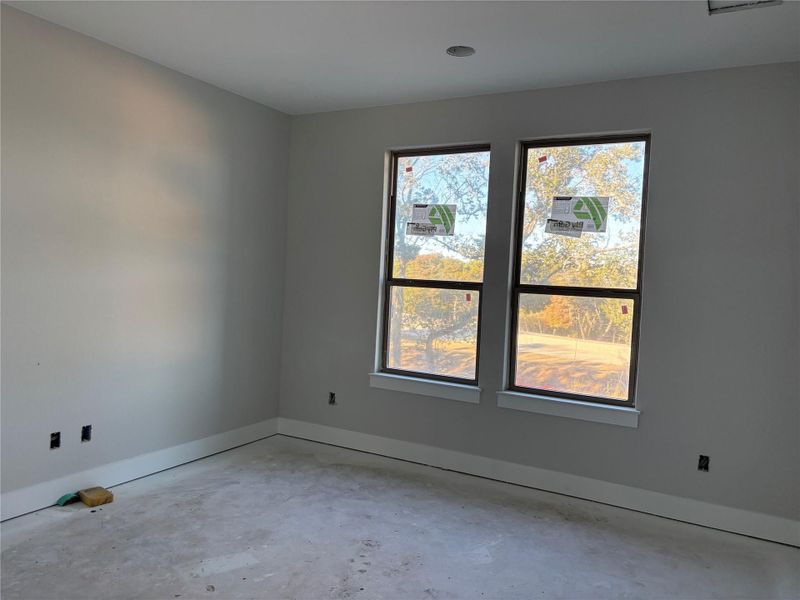 Spacious, unfurnished interior of a new home in The Hollows on Lake Travis, Leander (Image 24).