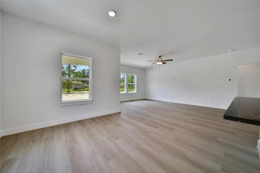 Spacious, unfurnished interior of a new home in Roman Forest, New Caney (Image 22).