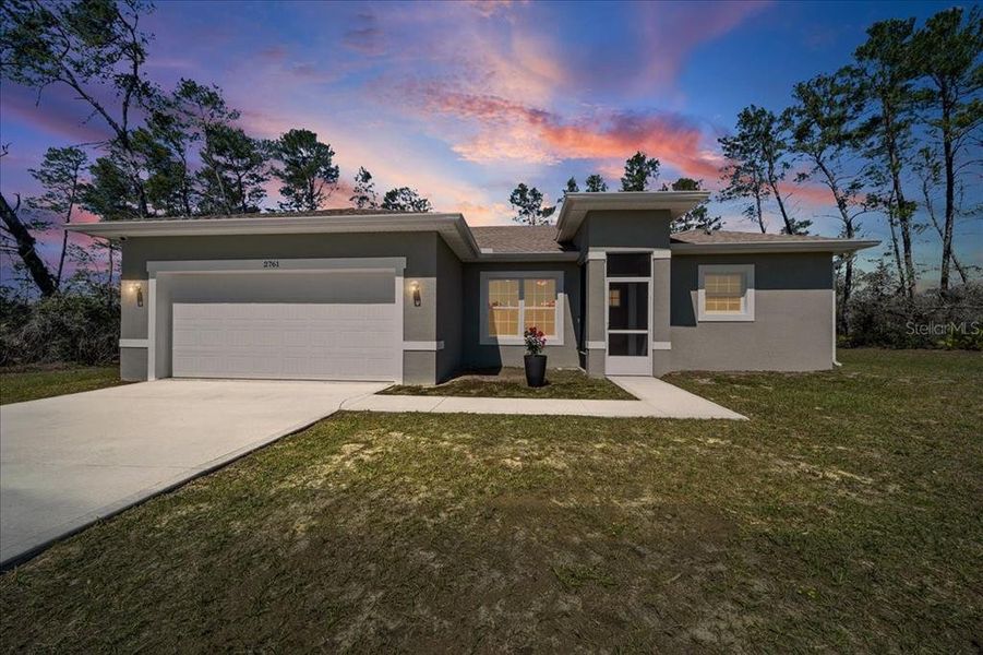 Front exterior of a new home in , Ocala, FL, highlighting curb appeal (Image 23).