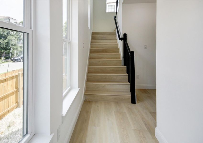 Natural light poor into the entryway