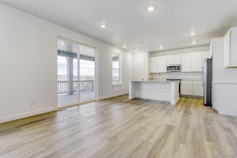 Spacious, unfurnished interior of a new home in Newlin Crossing, Parker (Image 22).