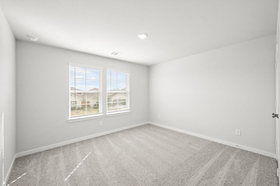 Spacious, unfurnished interior of a new home in Sunterra, Katy (Image 33).