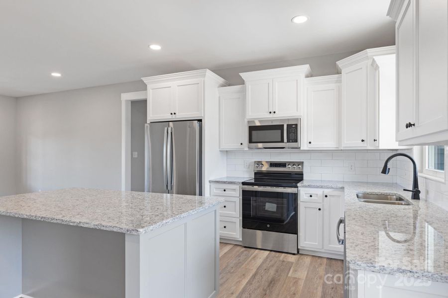 Furnished interior view inside a new home in , Vale (Image 3). Furnished interior view inside a new home in , Vale (Image 3).