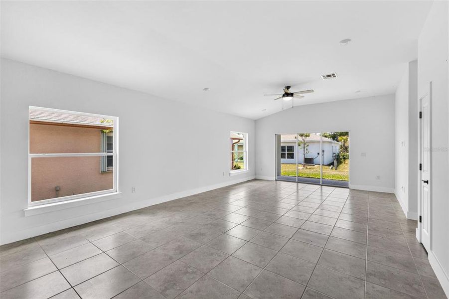 Spacious, unfurnished interior of a new home in , Port Charlotte (Image 16).