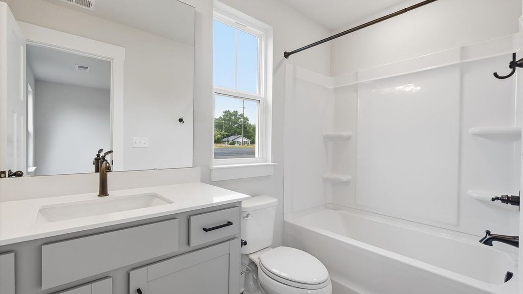 Notable full bathroom offering tasteful details and a bright, functional space in Piedmont, SC Notable full bathroom offering tasteful details and a bright, functional space in Piedmont, SC