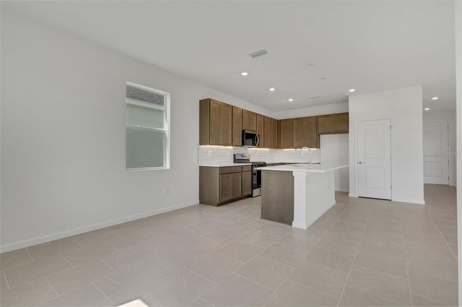 Furnished interior view inside a new home in Brystol North at Wylder, Port St. Lucie (Image 9).
