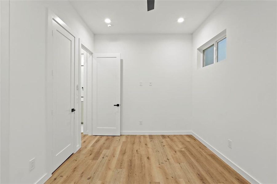 Empty room featuring light wood-type flooring